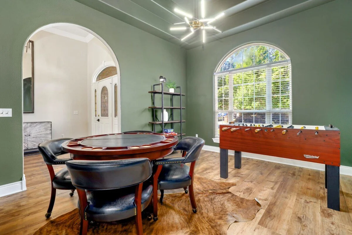 Walk through the front door and you'll be greeted by our entryway. To the left, you'll see a Game Room.