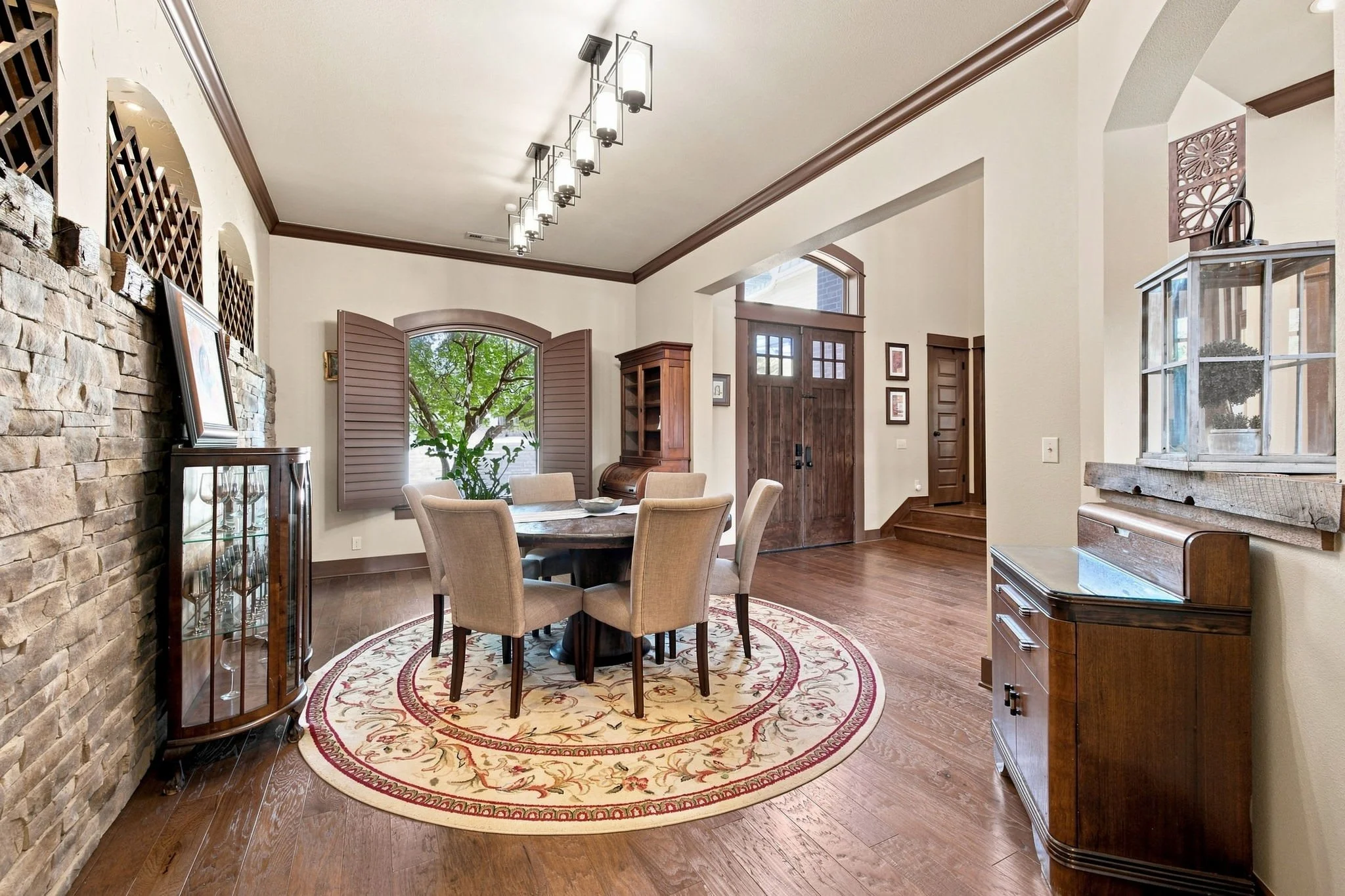 The nearby formal dining area has another table for 6. 