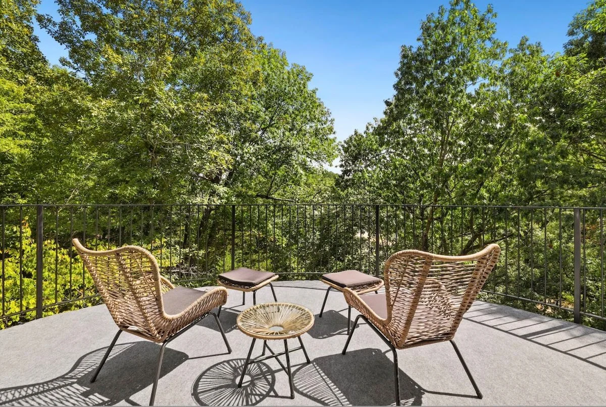 Outside, there is a small patio space with 2 chairs overlooking the lake - this is our favorite place to enjoy the morning's coffee.