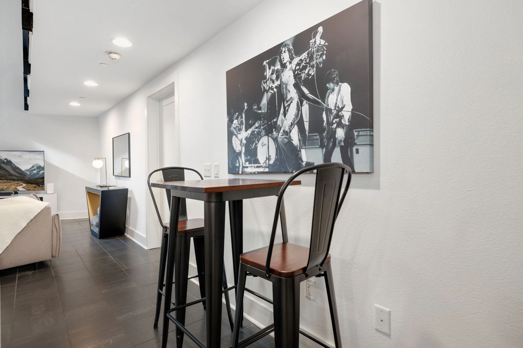 Fun, bar style seating is located just to the left of the kitchen.