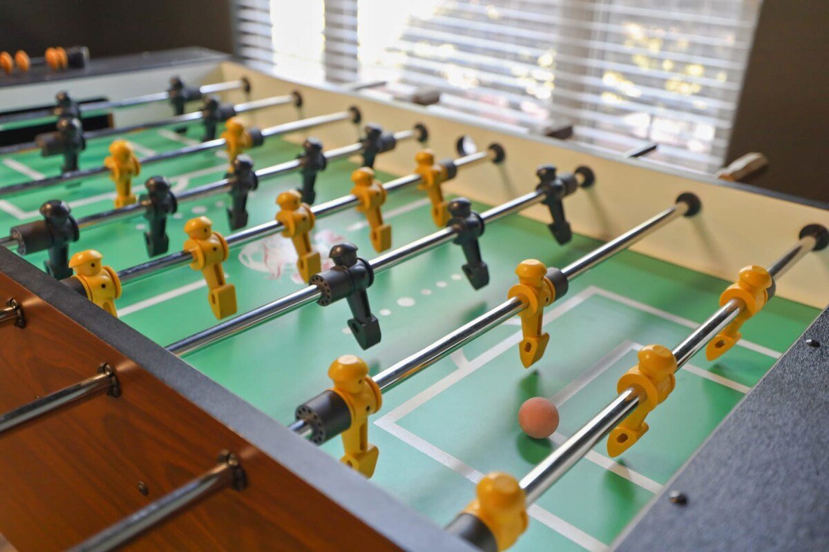 In the game room you will find a foosball table and four-top poker table.