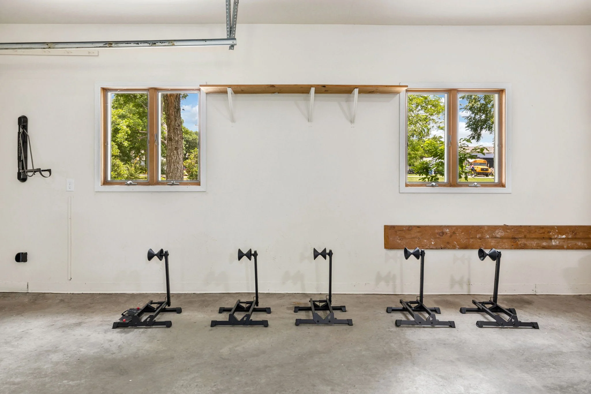 Garage parking for 3 cars and bike stations.