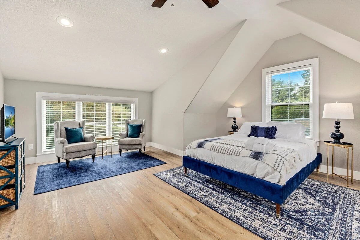 It includes a Queen-size bedroom that connects to an open bedroom with 4 twin beds built into the walls. 