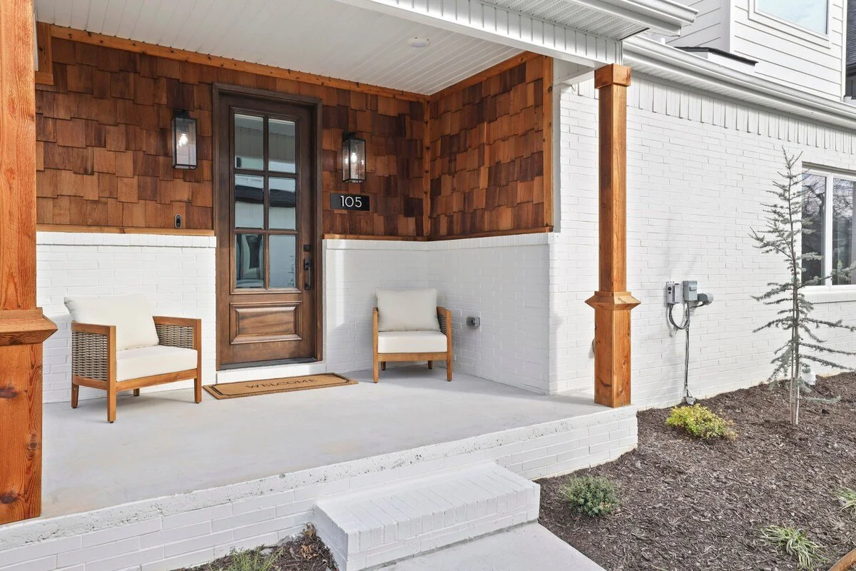 The cozy front porch is another great place to relax, read a book or observe life in our pocket neighborhood.