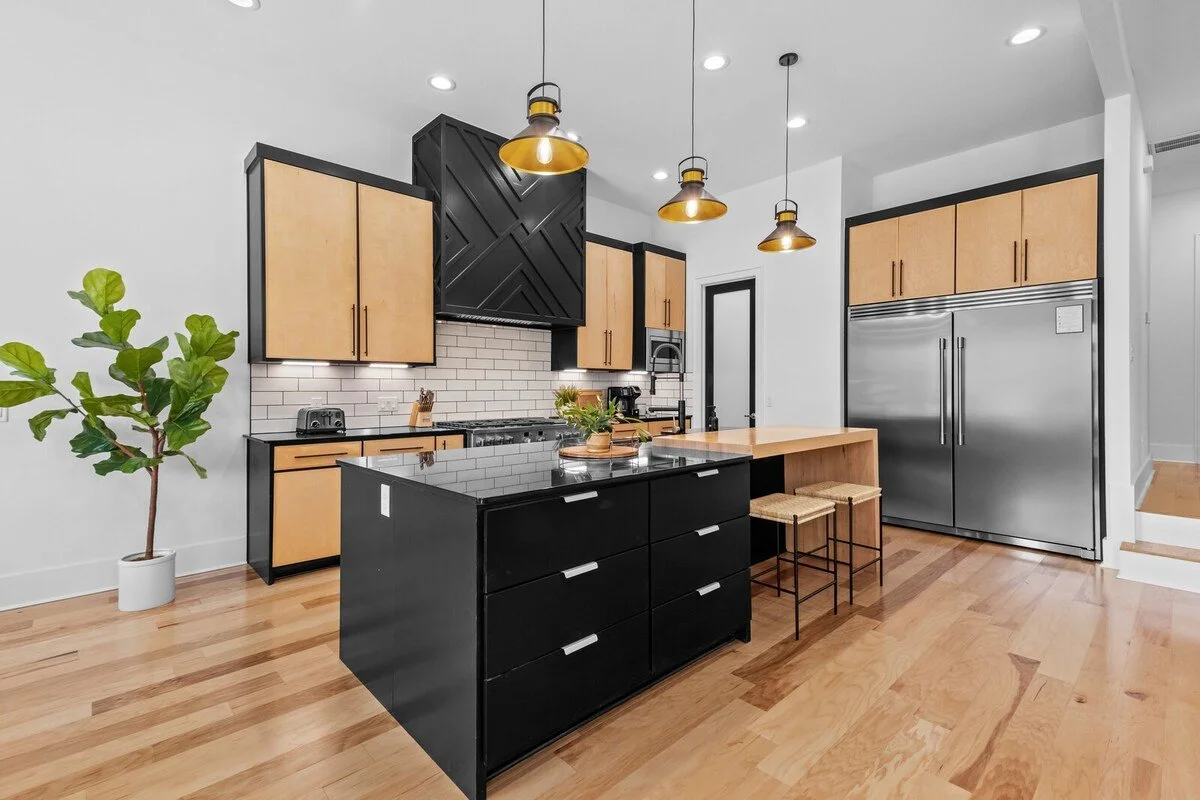 Complete with a restaurant sized subzero refrigerator, plenty of prep space, a bar top with bar stool seating, and a massive walk-in pantry with counter tops complete with a bar top and the essentials you need to create your favorite meals. 