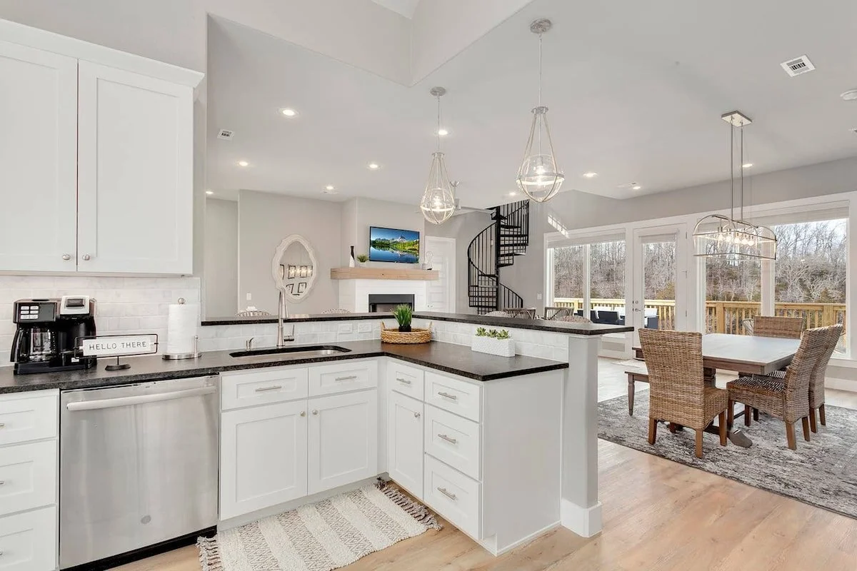 The kitchen is fully stocked and includes all new appliances, a coffee station, and plenty of dishes/utensils for large groups. 