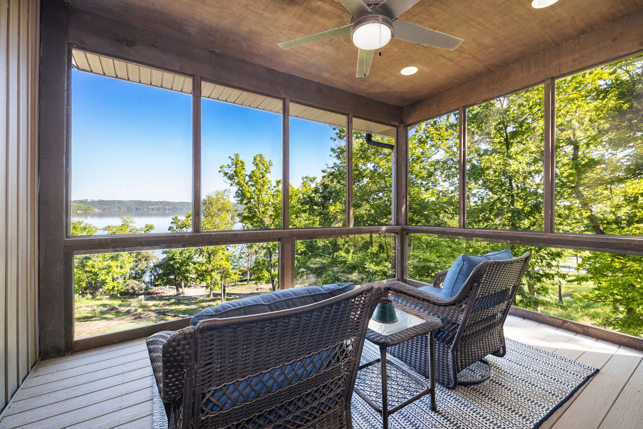 This screened-in porch is a wonderful place to escape with a good book or savor your morning coffee or tea.