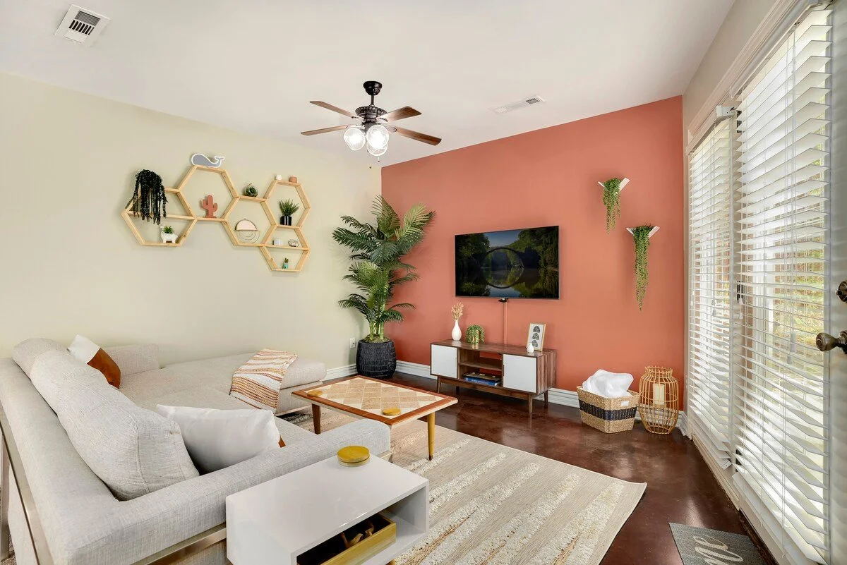 Here, you’ll also find our second living space, which is home to a super comfy sectional and Smart TV. 