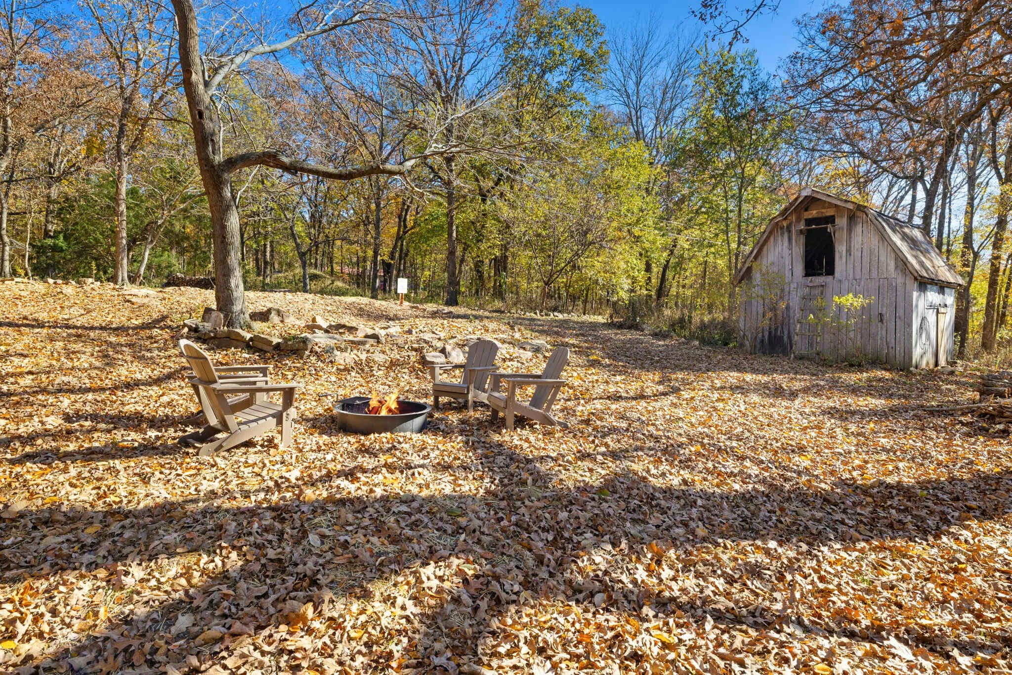 Stroll through the wooded acreage on private walking trails where you can discover art pieces along the path!