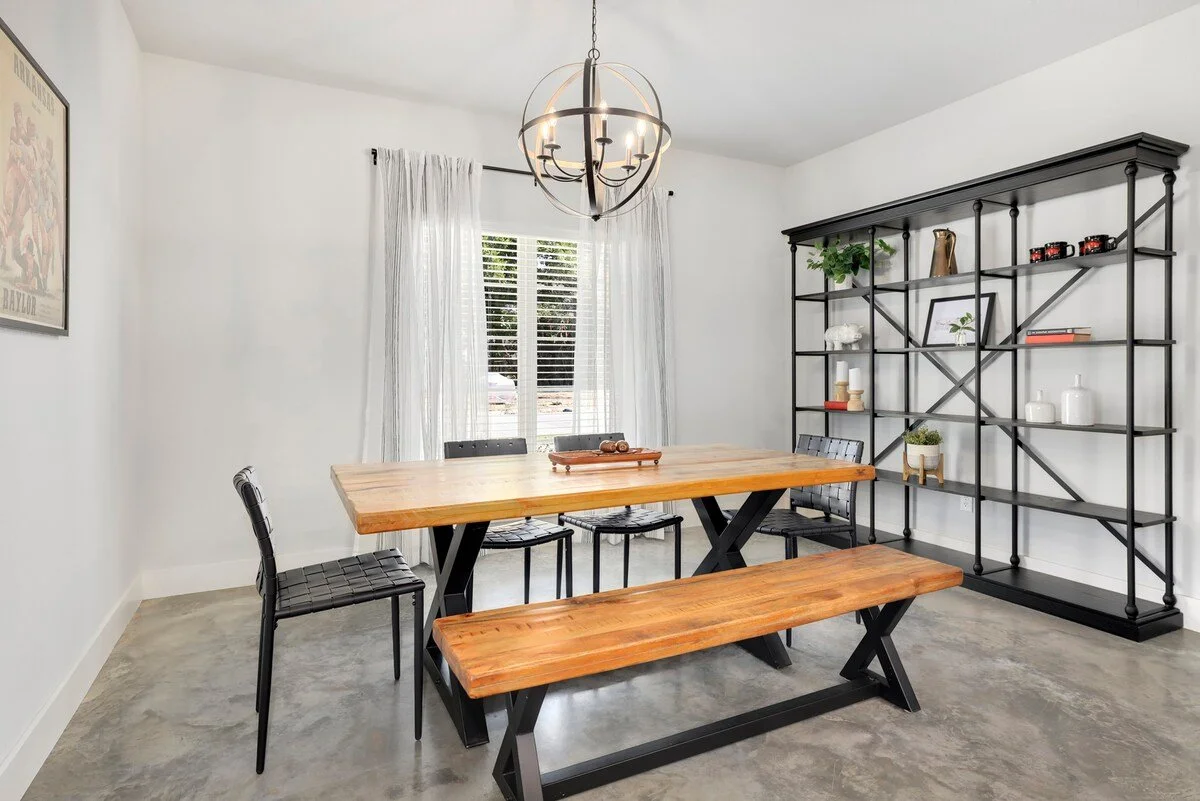 In the alcove to the left of the kitchen, you'll see our stunning 6-top dining table. 