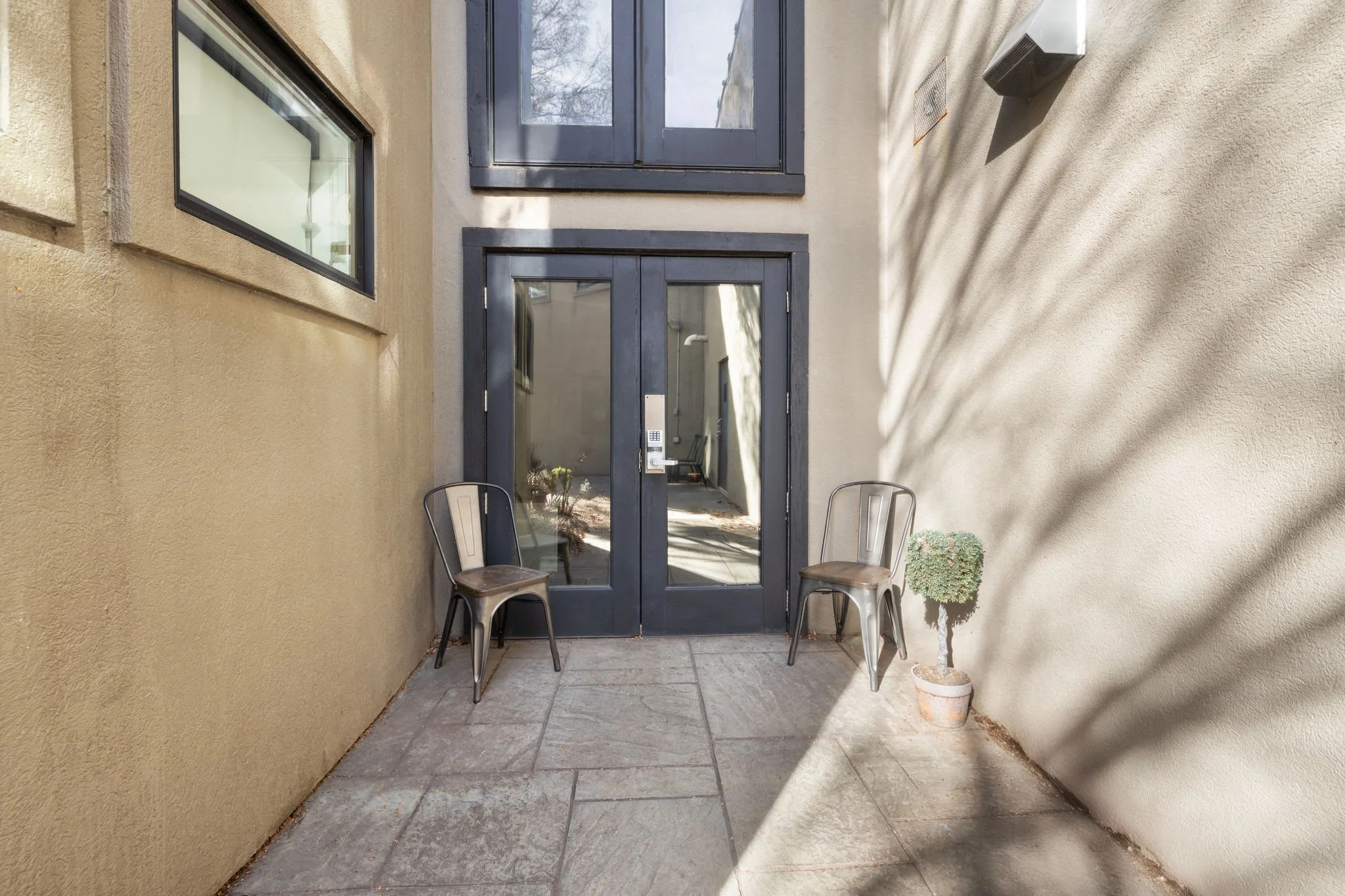 Step through our double doors into...