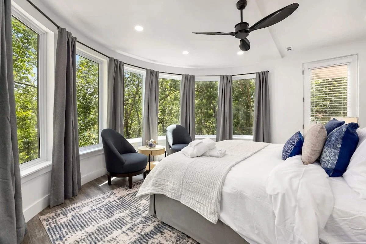  Our 3rd floor also has two relaxing king size suites. Plus, a private balcony with seating for two! — In total, Rocky Summit has accommodations for 12 guests!