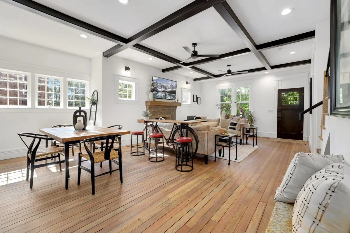 When you enter the front door, you’ll discover a spacious open concept living space with exposed iron beams, modern design and unique vintage touches. 