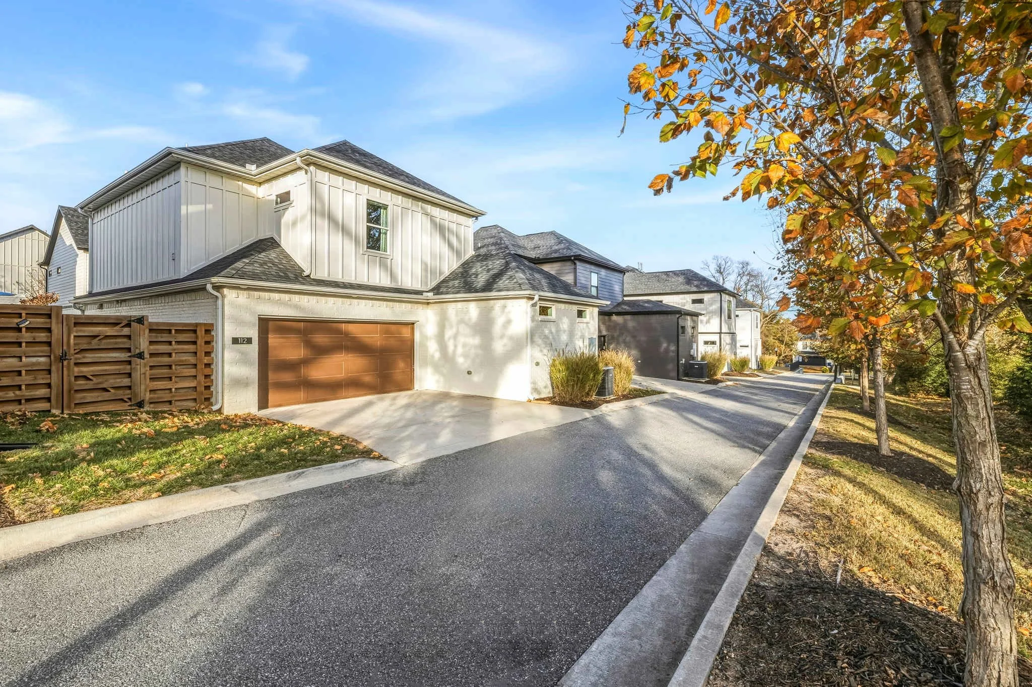 The garage has an electric car charging port and enough parking space for 3 cars. 