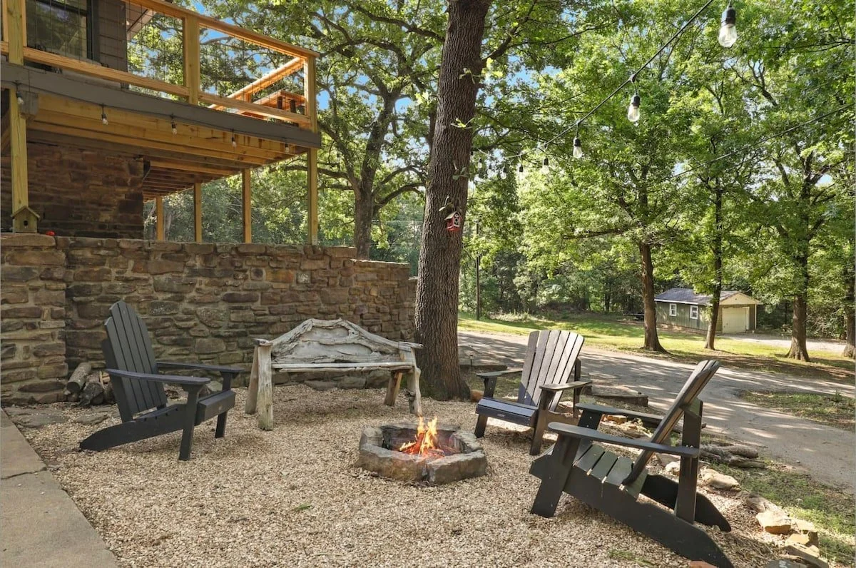 On the lower deck by the garage, you'll find a gas grill and fire pit. This is the perfect place to enjoy that fresh Arkansas air! 