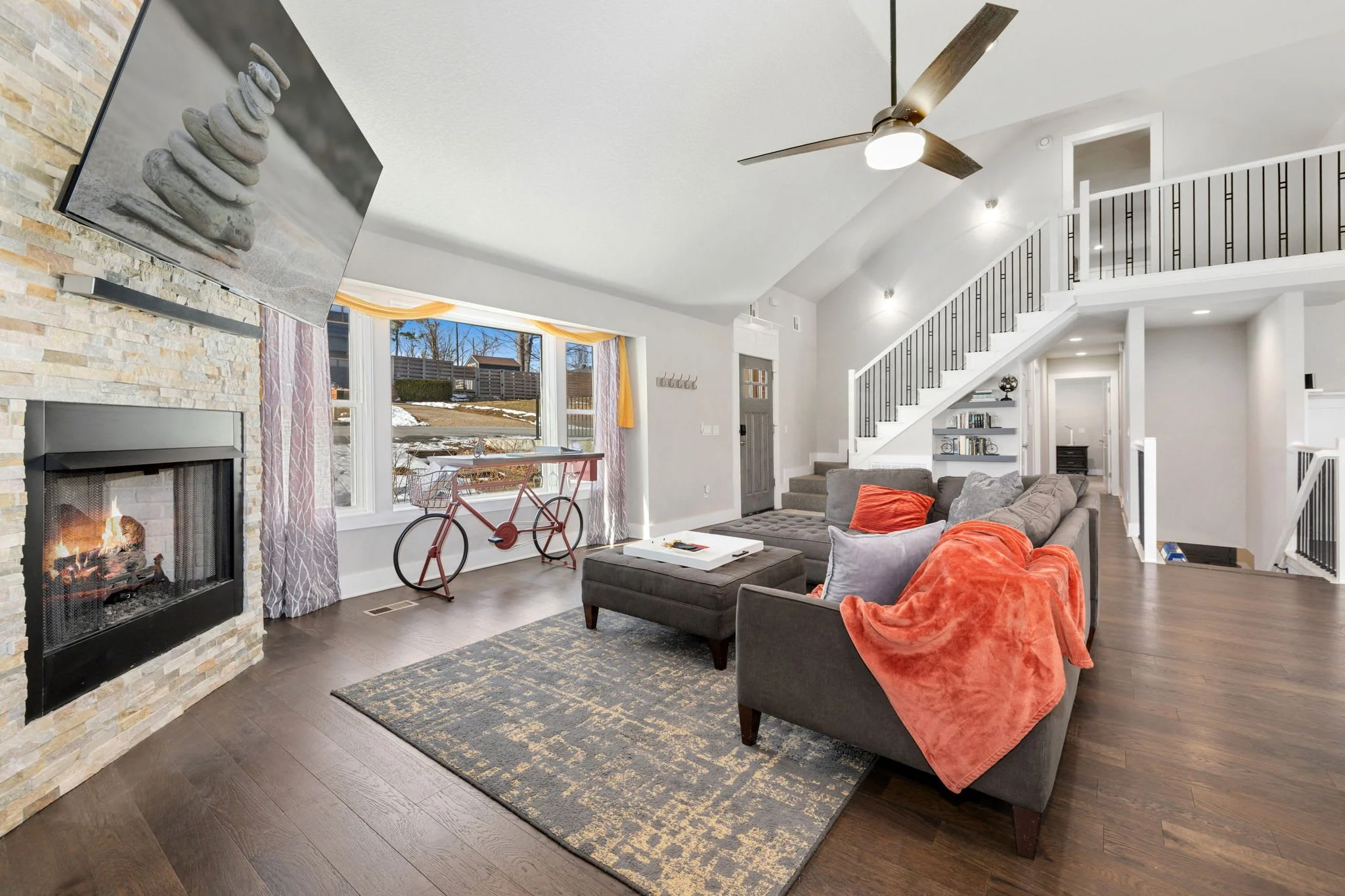 Once inside, you’ll be greeted by our open concept living space, kitchen, and two dining spaces.