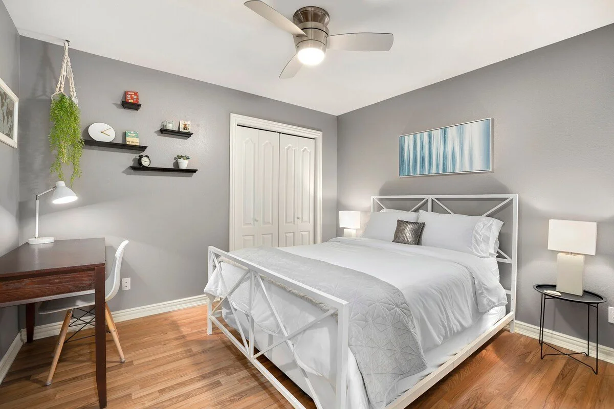 The downstairs level features three more private bedrooms.