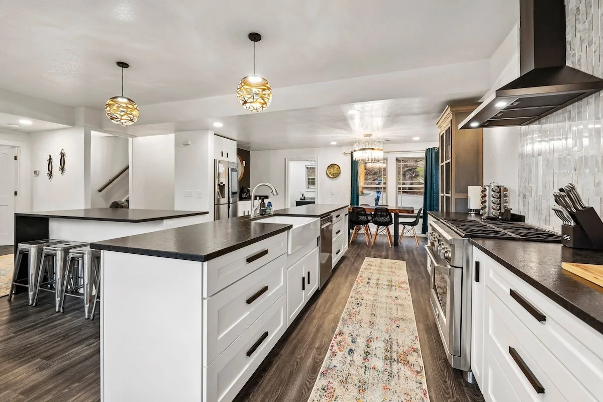 Directly in front of the kitchen, you’ll see our bar with 4 barstools.