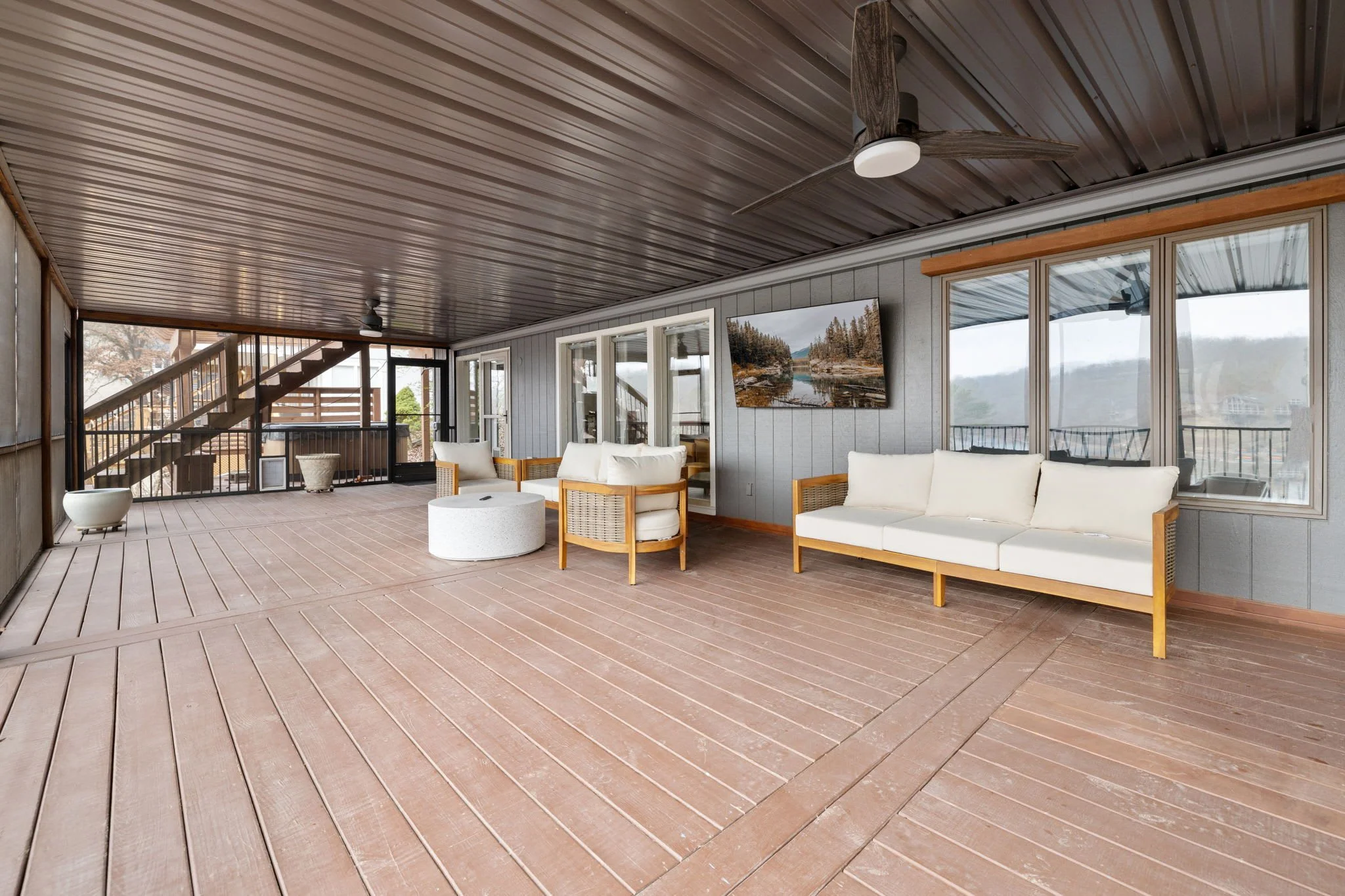 From the game room, access our cozy screened in porch.