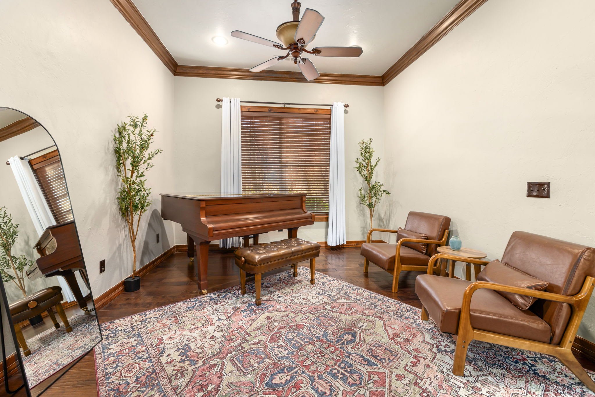 Across from the living room, there is additional seating and a grand piano! 