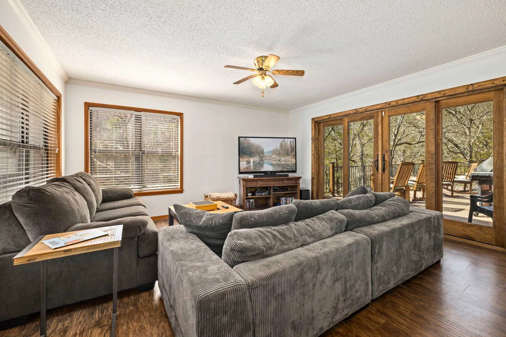 Kick back and relax in the living room with plenty of seating options and a Smart TV for entertainment.