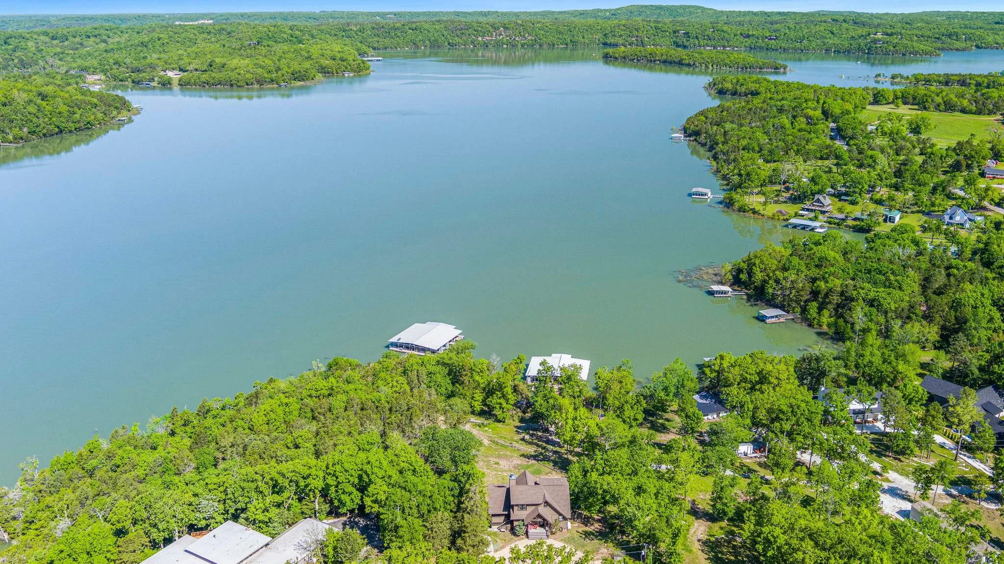 It's easy access to Beaver Lake for a day of fun in the water! Use the kayaks and paddle board to explore the lake or just float around on the Lily Pad. 