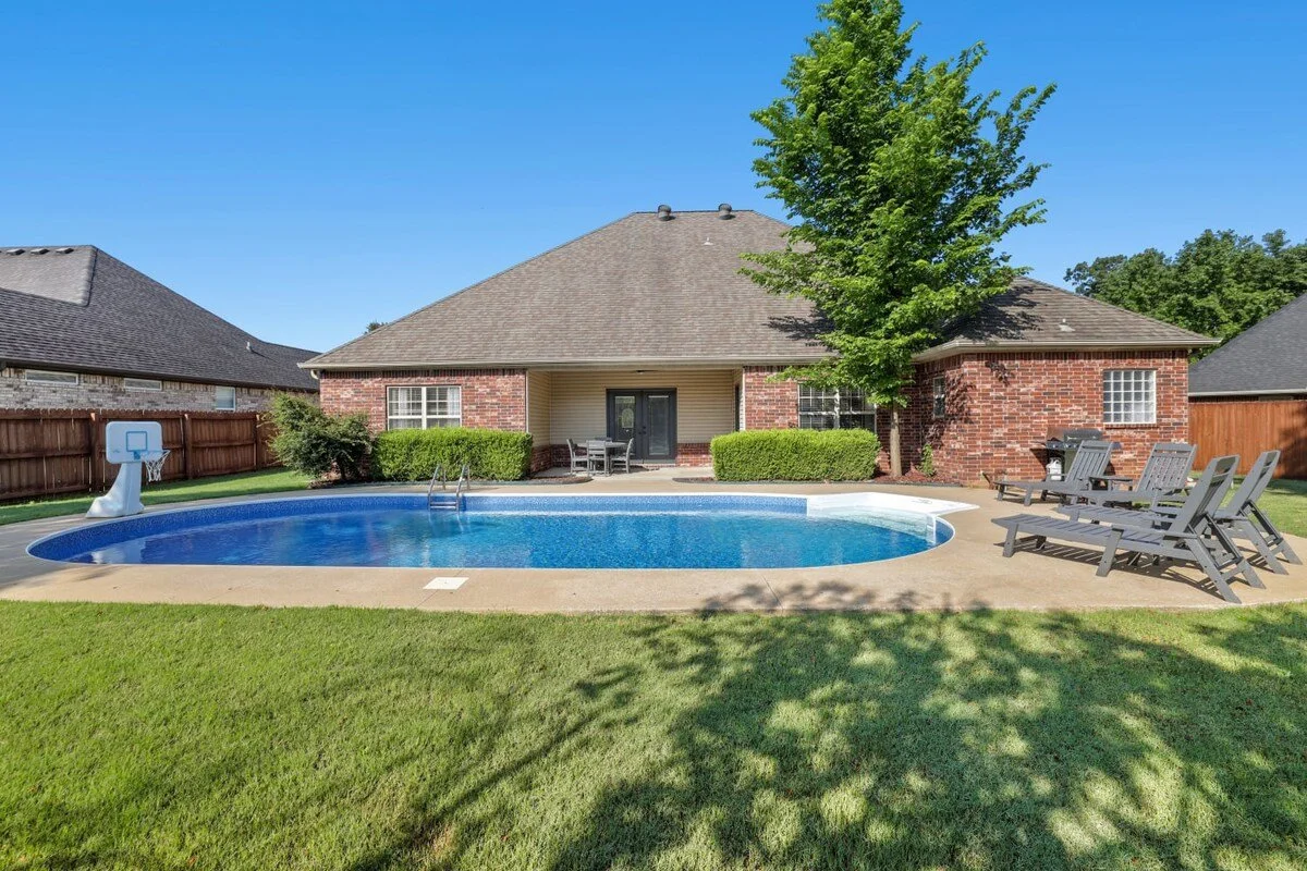 Out back, relax in our large private pool! Looking to soak in a little sun? We have four chaise lounges surrounding the pool. 