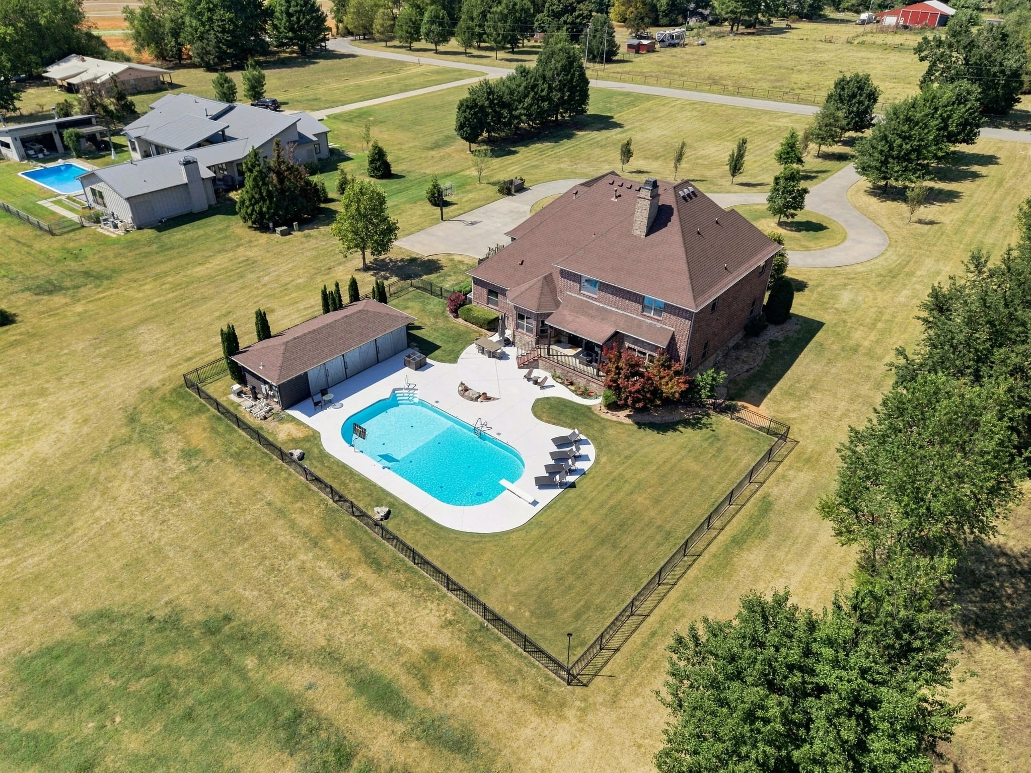 Beyond the pool, enjoy playing games, soccer, football in the yard with your crew. In the mood for a pick up game, there is a basketball hoop in the driveway.