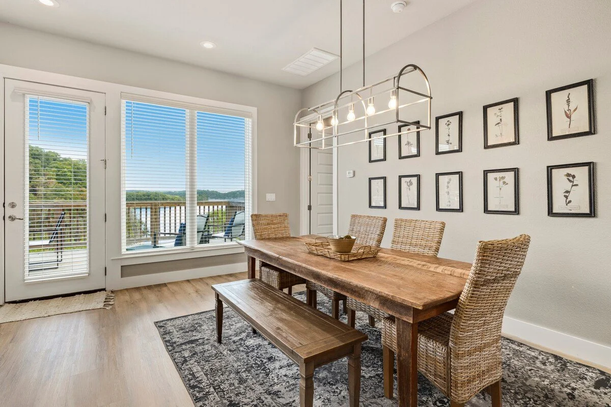 Meet up in the dining area with plenty of seating, including dining tables inside and out on the deck plus bar stool seating at the kitchen.