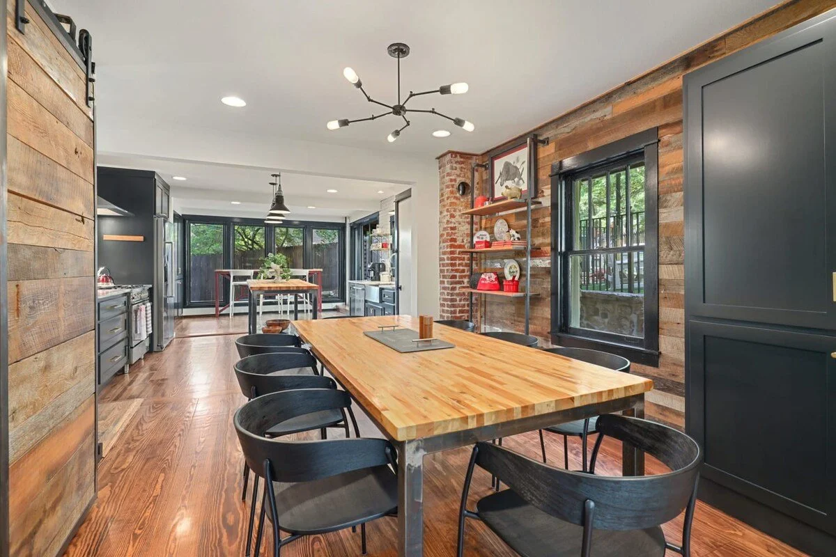 Our kitchen and dining room includes 8-person dining table, large kitchen island, and bar window seating.