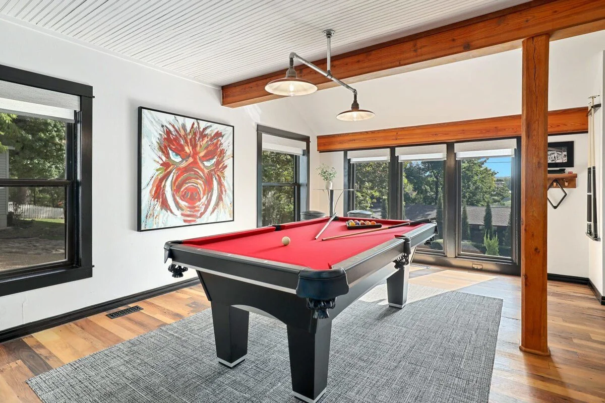 This space is great for entertaining - including a multitude of windows,pool table, window seats, and plenty of Hog themed board games.