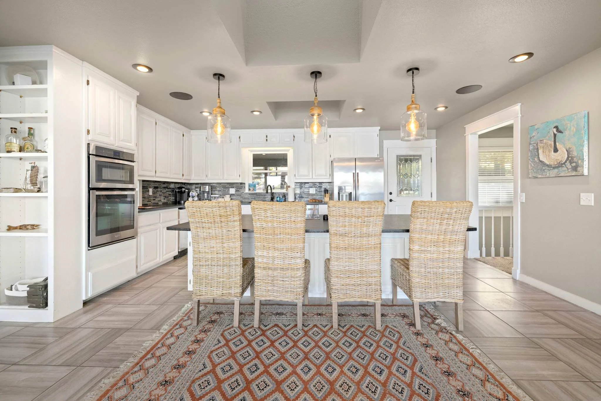 Convenient counter seating along the kitchen island.