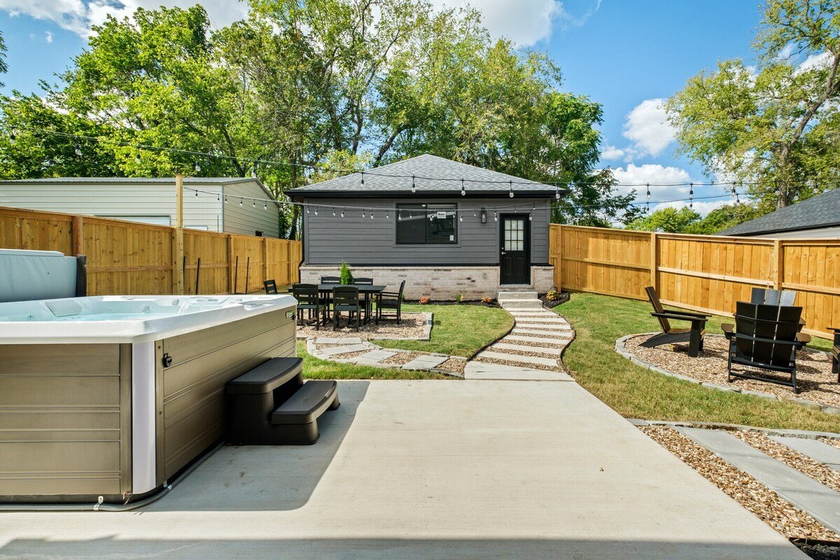 Our garage is separate from the house and is located around back - accessible by the driveway or through the back yard. It is available for use by all guests! Complete with bike stand and able to park up to three cars.