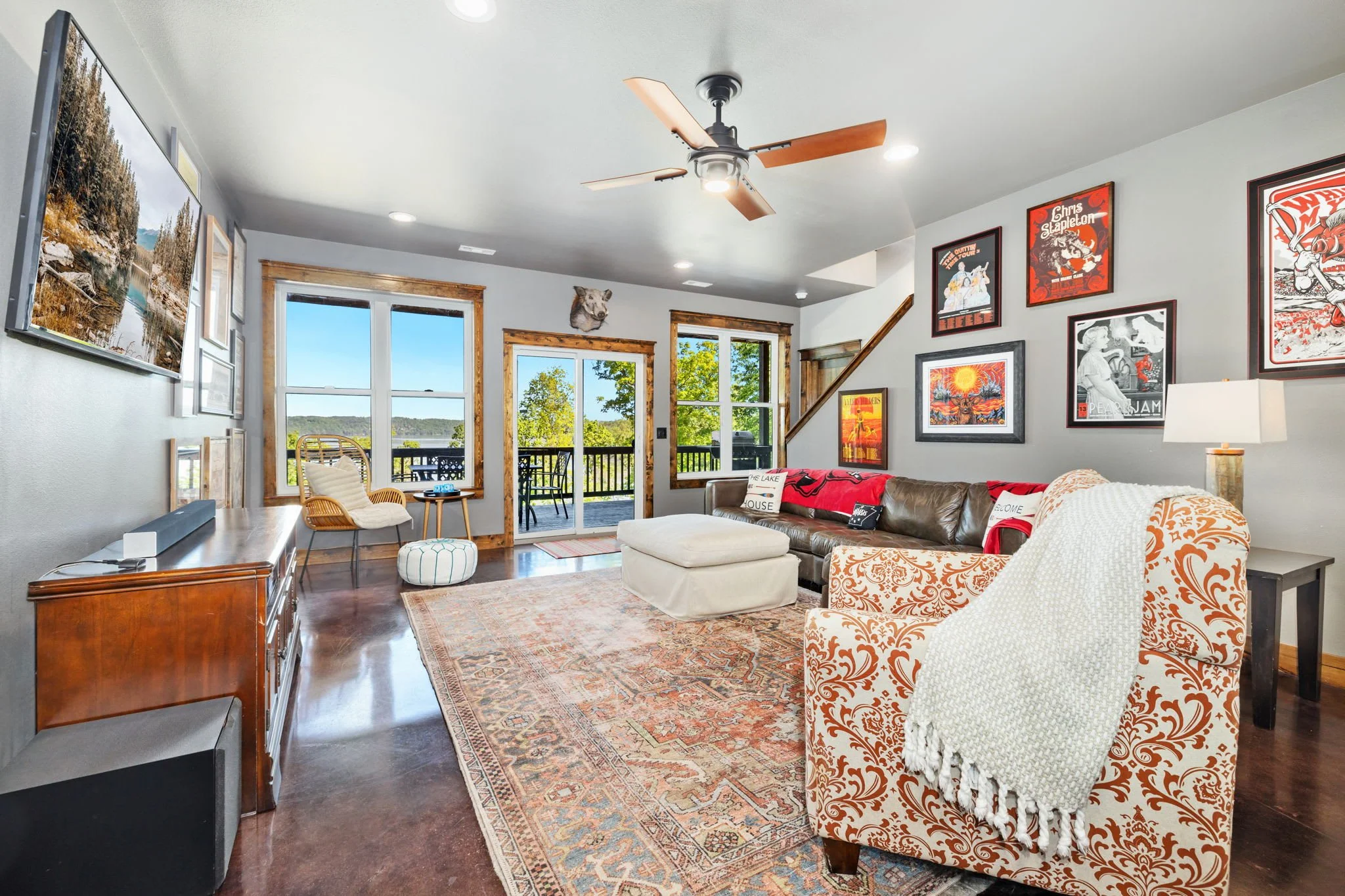 Head downstairs for an additional living room and access to our deck patio space.