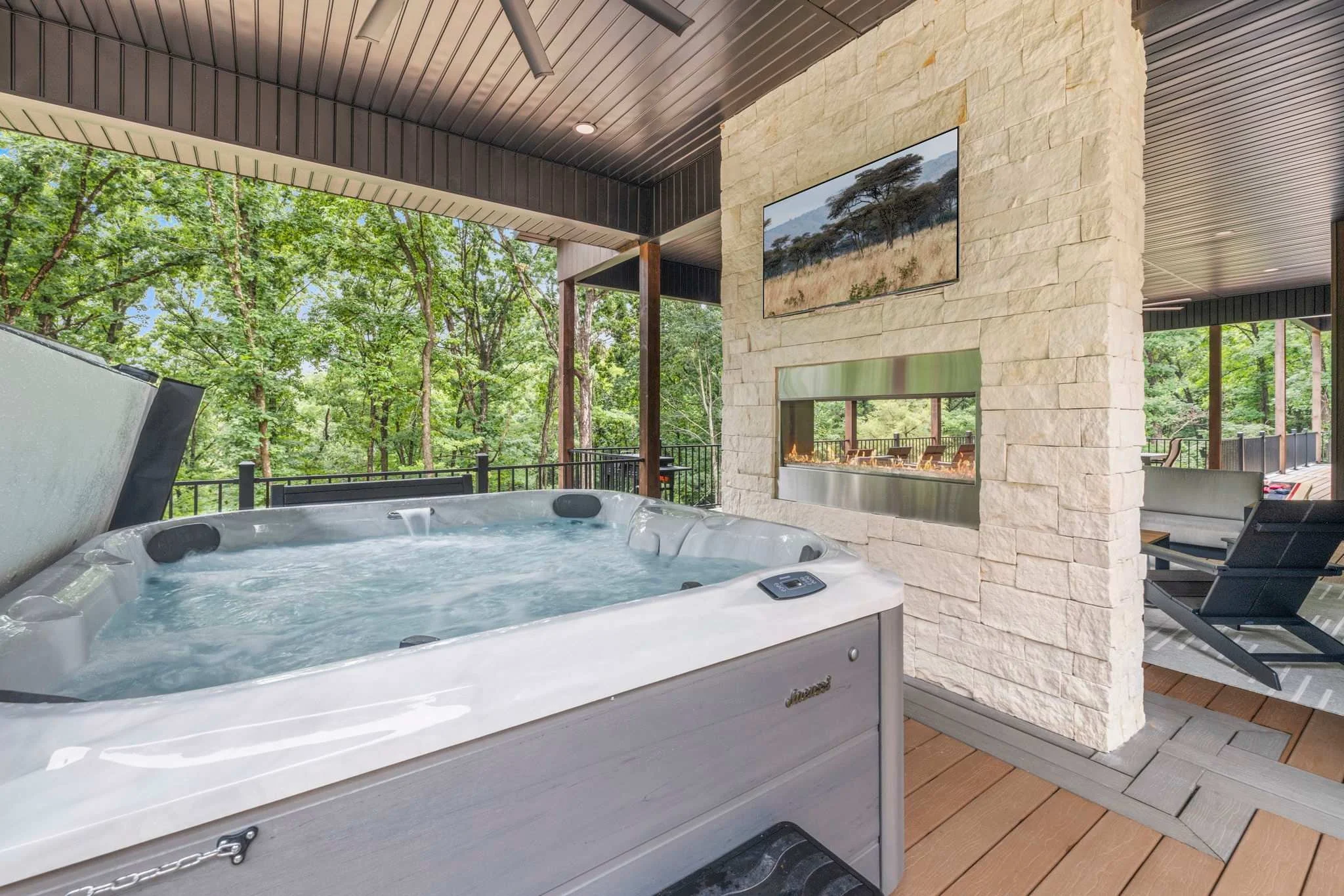 At Roaring River Hideaway, if you're not at the State Park, you are on the patio! Relax in the hot tub while watching your favorite show.
