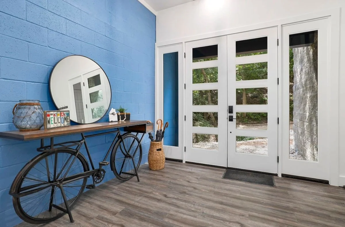 Our main entrance is to the right of the garage.