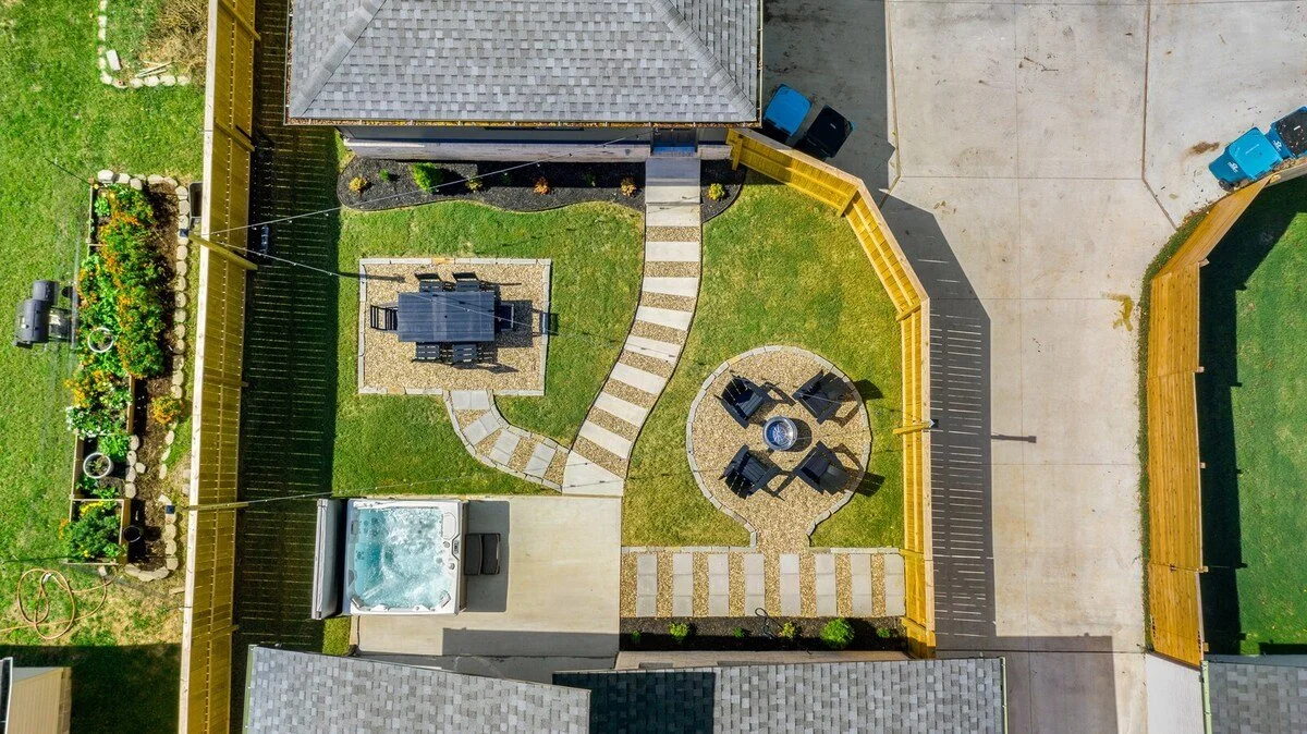 Our back yard features a landscaped back yard, is fenced-in...