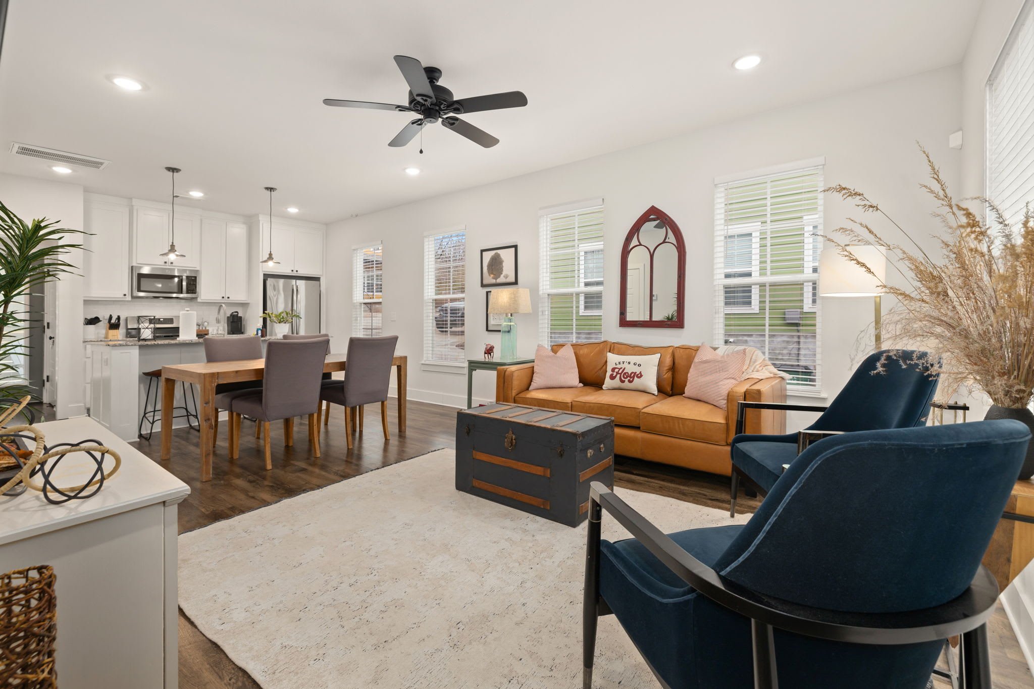 When you enter, the first floor is bright and open concept living room, dining and kitchen with colorful decor!