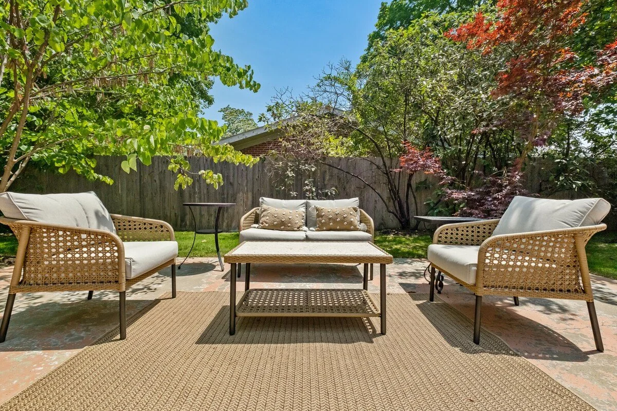 Out back, enjoy our patio and fenced-in yard! 