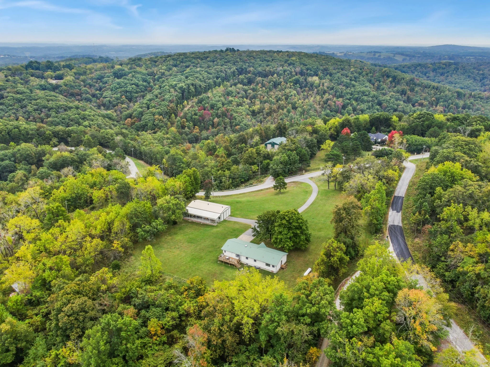 Our serene acreage overlooks the Ozark Mountains.