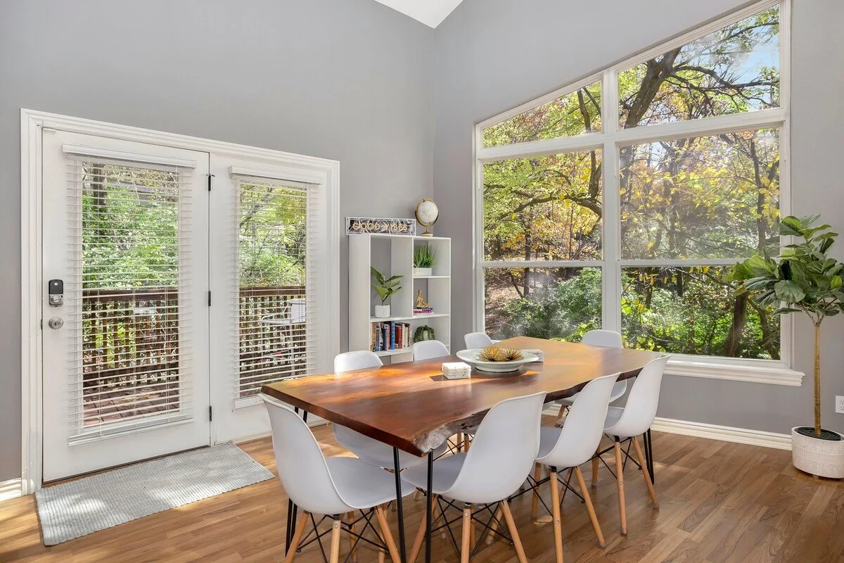 An 8-top dining table sits between the living-kitchen area, offering a comfortable place to enjoy meals. The perfect place to cook a meal while continuing the fun and conversation with your loved ones! 