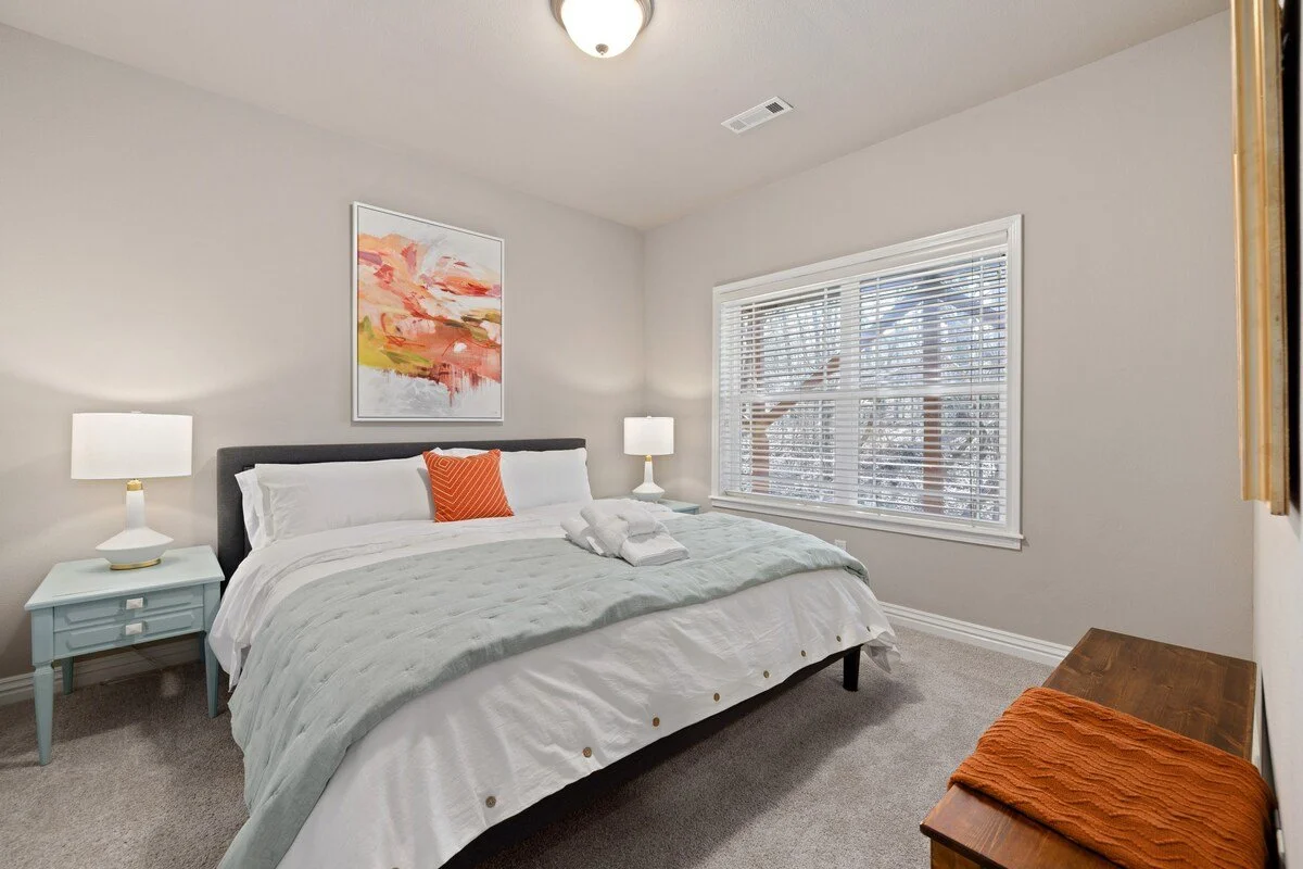 The lower level of our home has 2 bedrooms, one featuring a King-size bed, and the other featuring a Queen-size bed + a Twin-size bed.
