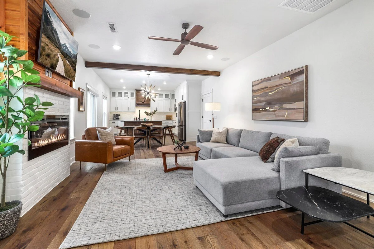 In the living area, you'll find a comfy oversized chaise sofa, comfy leather lounge chair, a 60-inch Samsung Smart TV and our stunning electric fireplace. The perfect place to relax after your day on the town.