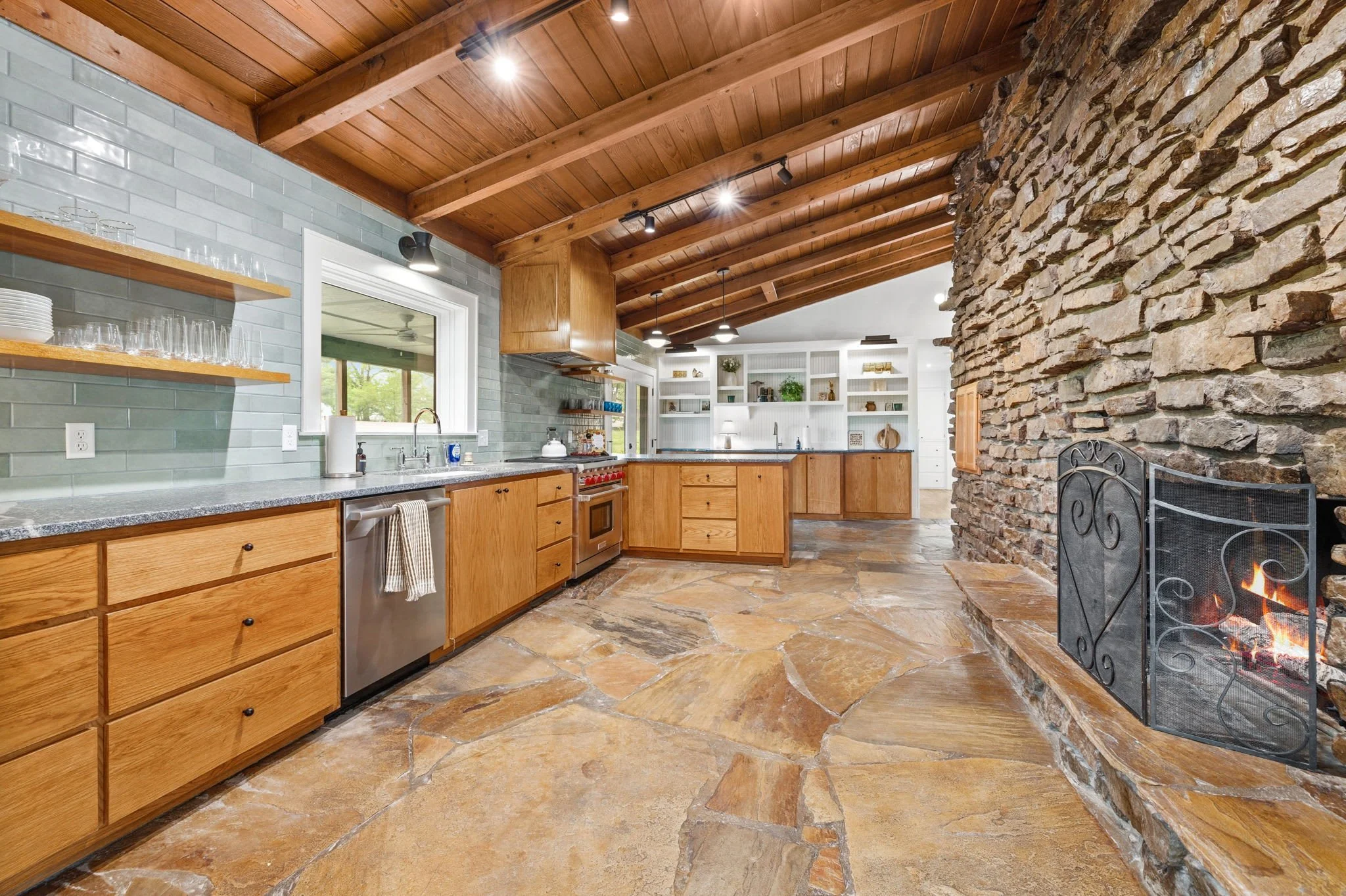 Our Gorgeous, fully stocked, open concept kitchen has everything you'll need!