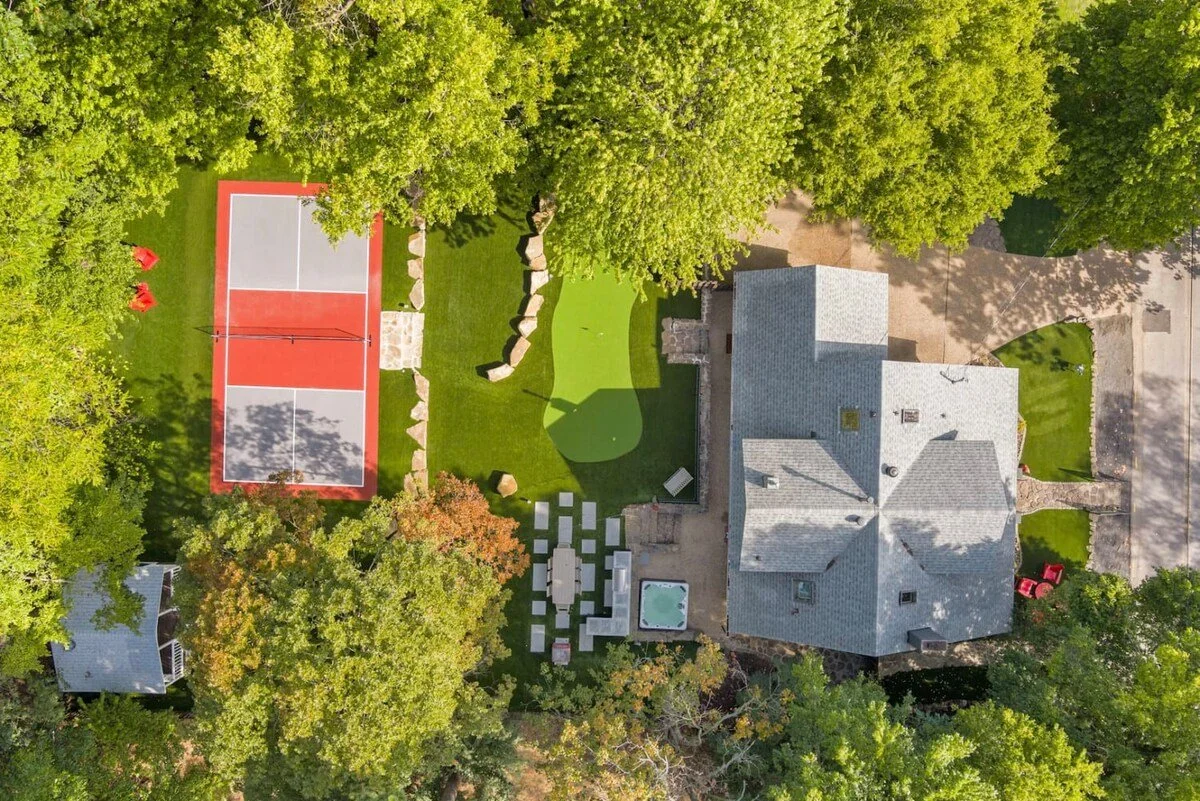 The entire yard can be enjoyed all season as the front & back yard is fully turfed.