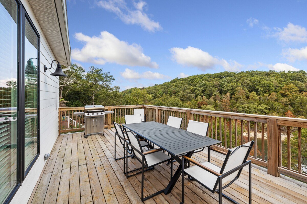 There is easy access to the top patio from the dining area, where you will find a gas grill to BBQ after a long day on the lake! 