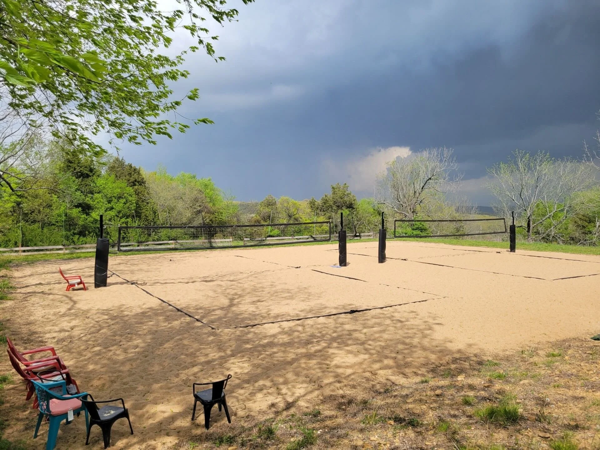 TWO full sized private sand volleyball courts!