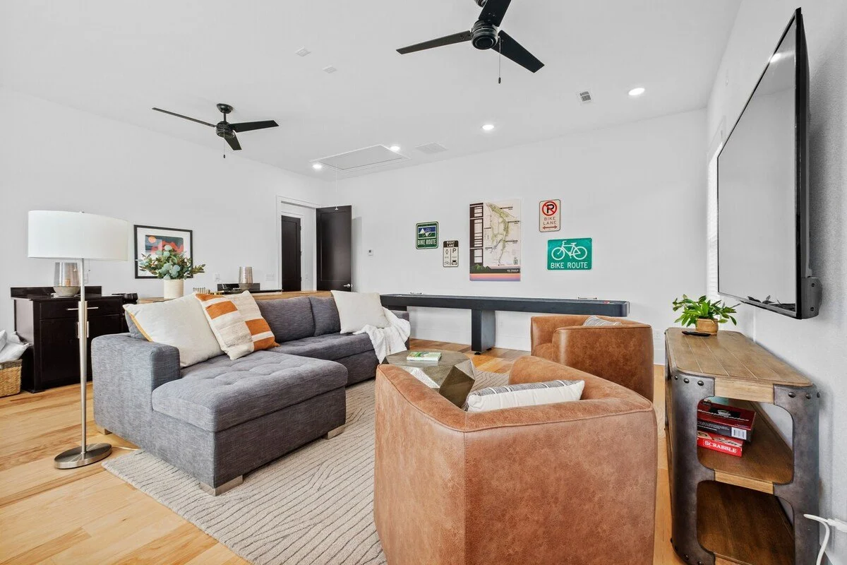 Head upstairs to our second living room/game room.