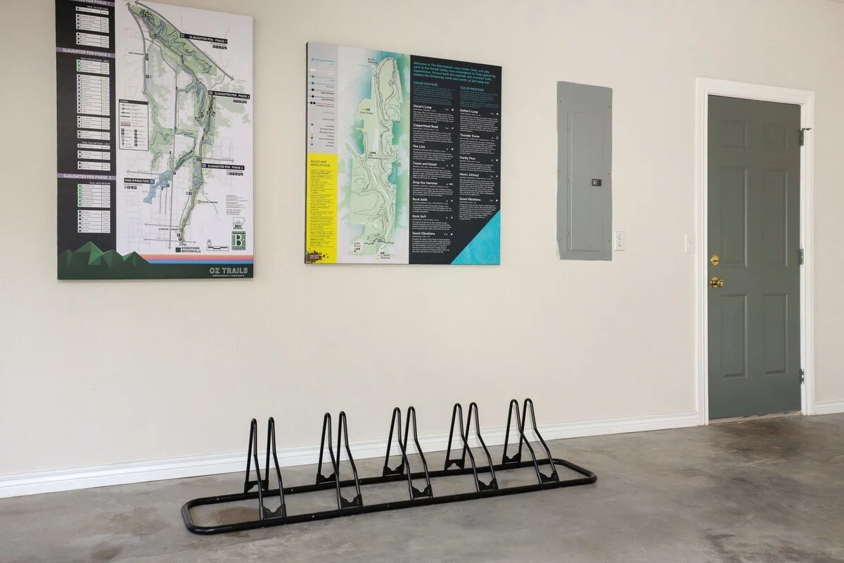 If you're visiting NWA for the hundreds of miles of MTB trails, we've provided safe bike storage in our finished garage! Here, you'll also find maps of Coler Mountain Bike Preserve, which is just TWO miles from our front door. Outside, you'll also ha