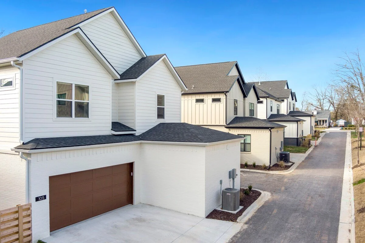 Parking space for 3 cars. One car in the garage, and two smaller cars can fit in the driveway.